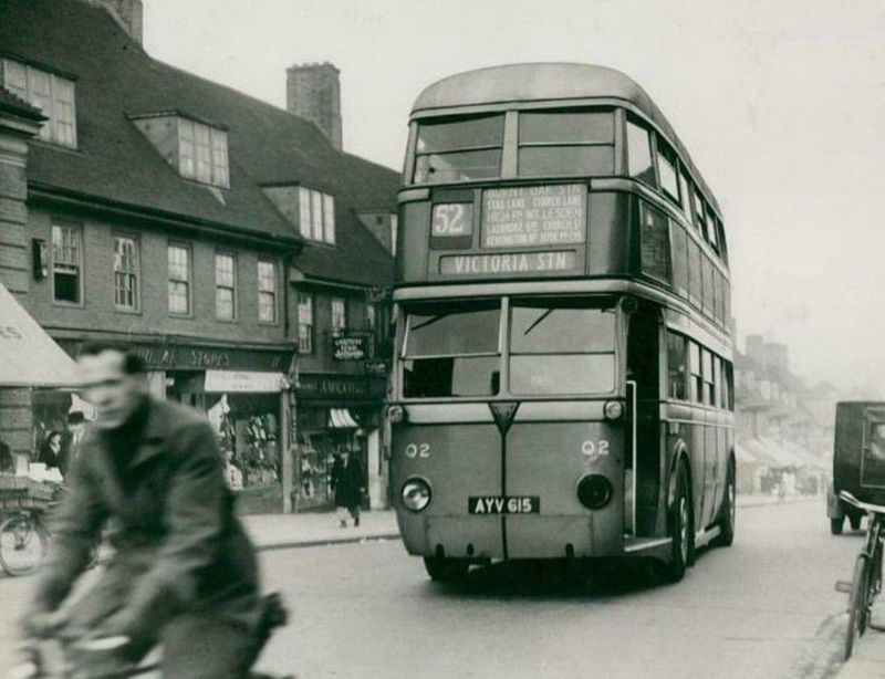 Photo of a London Street with Double-Decker Buses