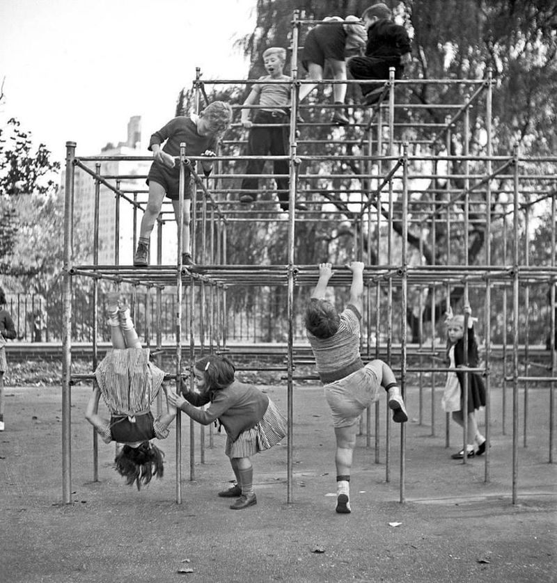 Climbing to the Top of a 12-Foot Jungle Gym Over Concrete