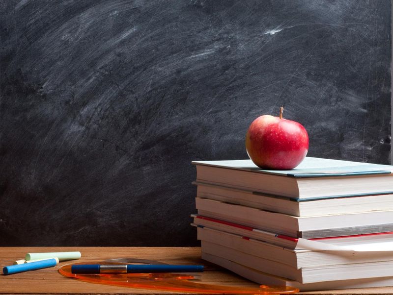 Giant Wooden Teachers’ Desks with Apple Motifs