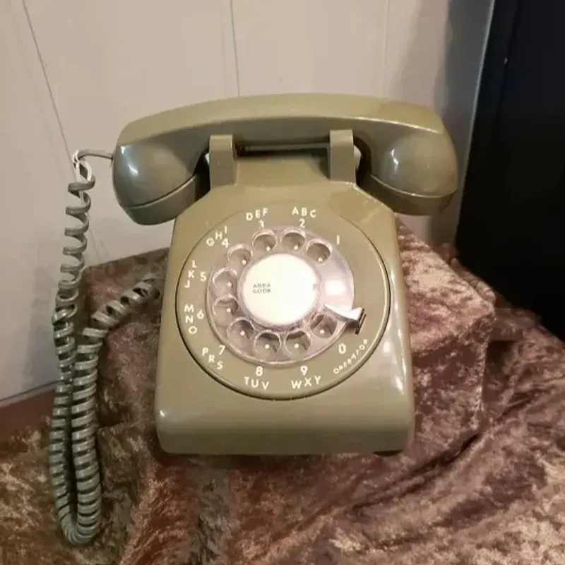 The Ring of a Rotary Phone Dial Returning