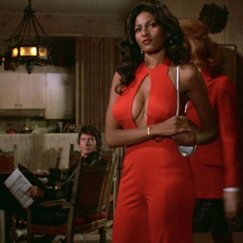 Pam Grier's Red Halter Pantsuit in 'Foxy Brown'