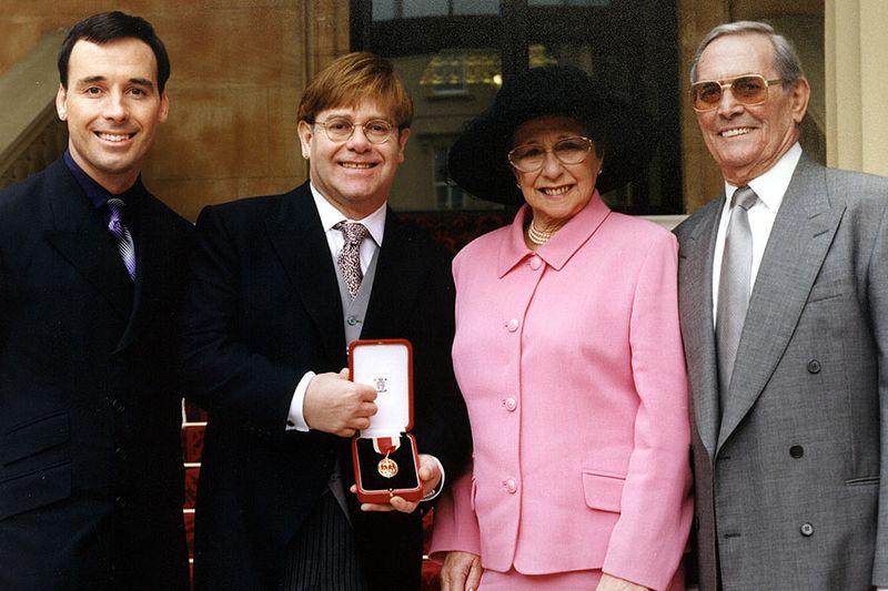 Elton John Receives Knighthood from Queen Elizabeth II