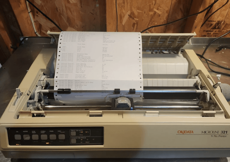 The Dot Matrix Printer's Robotic Chatter